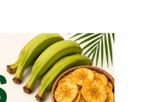 Green bananas beside a bowl of St Mary's banana chips